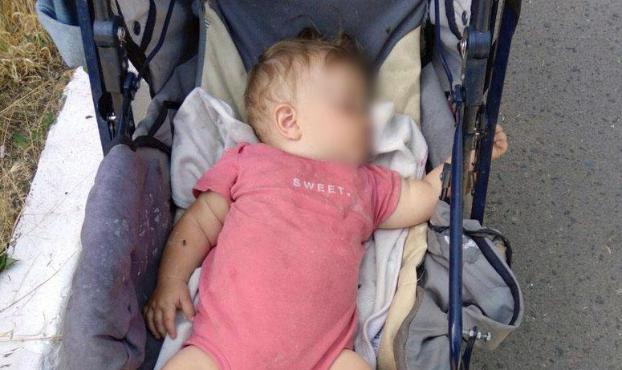 В Дружковке пьяная мать уснула под подъездом, оставив ребенка на улице