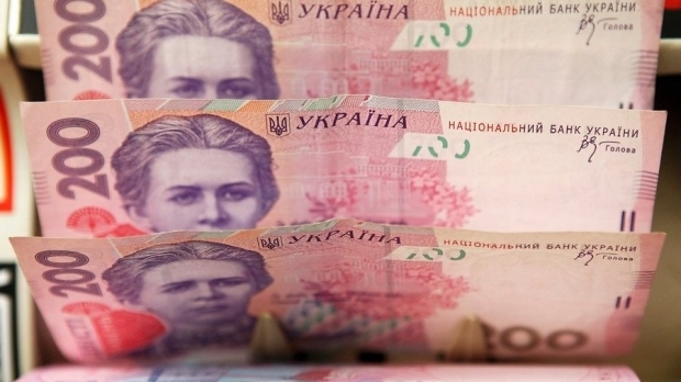 НБУ: Официальный курс гривни на межбанке укрепился до 23,40 за доллар