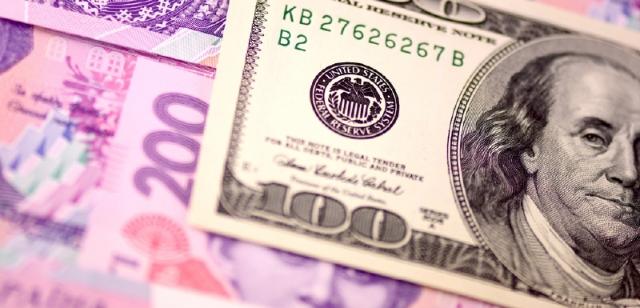 Официальный курс гривны к доллару Нацбанк укрепил 