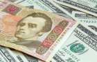 НБУ: Официальный курс гривни регулятор снизил до 27,23 за доллар